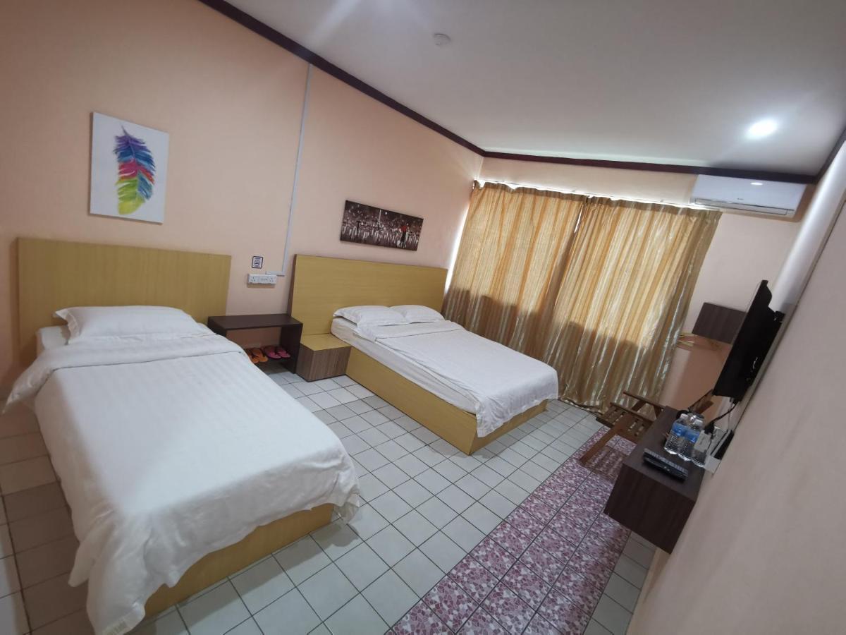 Indah Inn Тавау Екстериор снимка