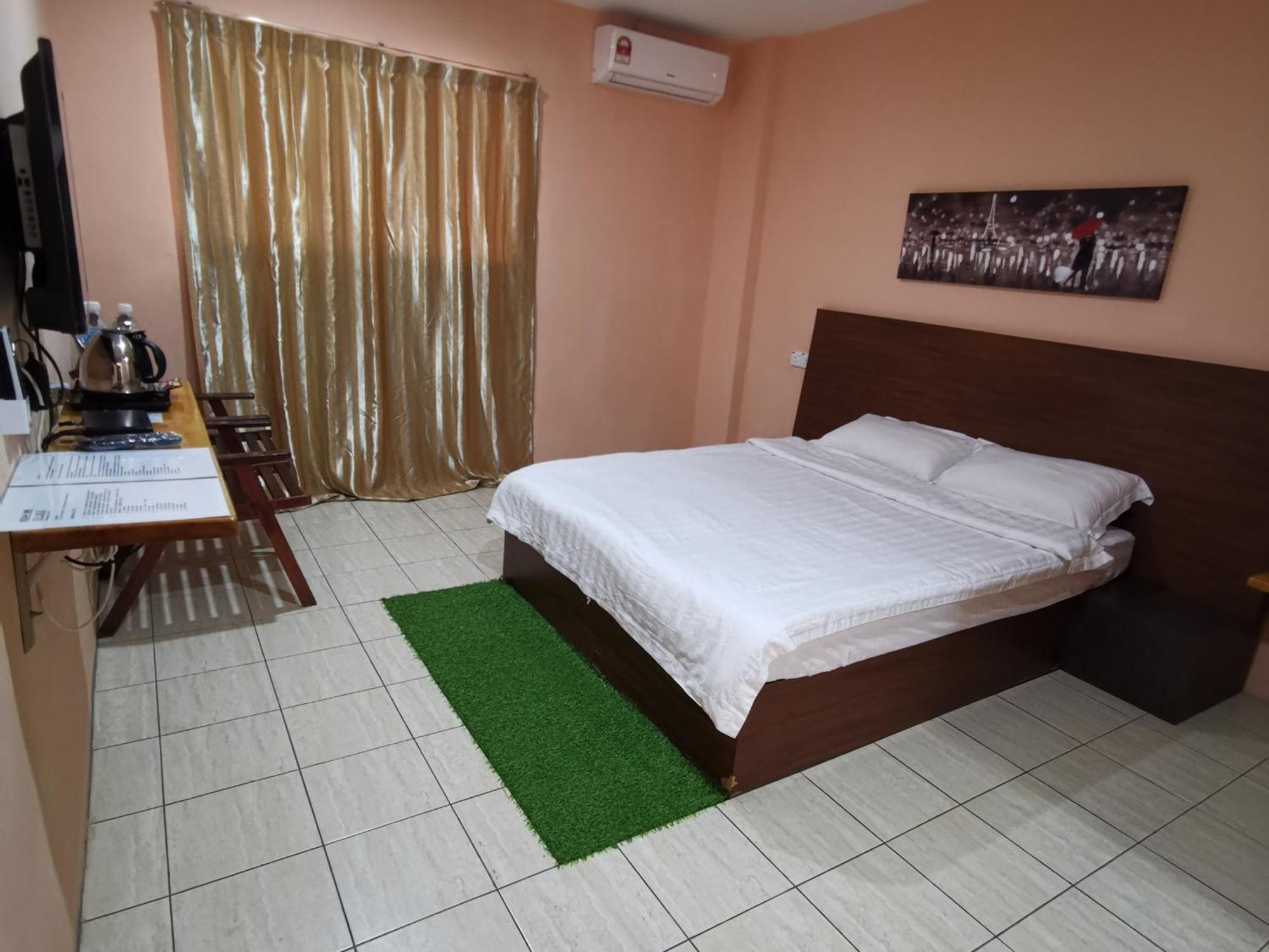 Indah Inn Тавау Стая снимка