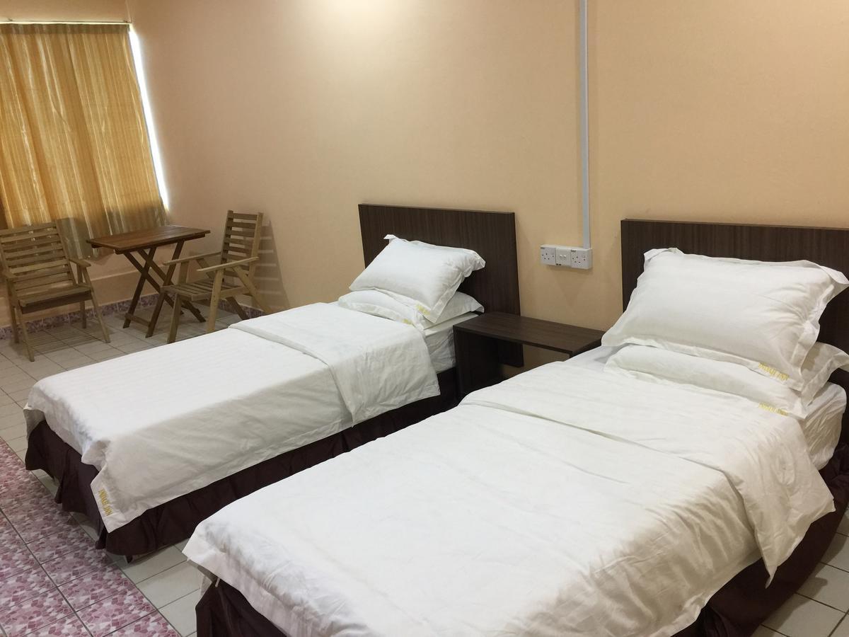 Indah Inn Тавау Екстериор снимка