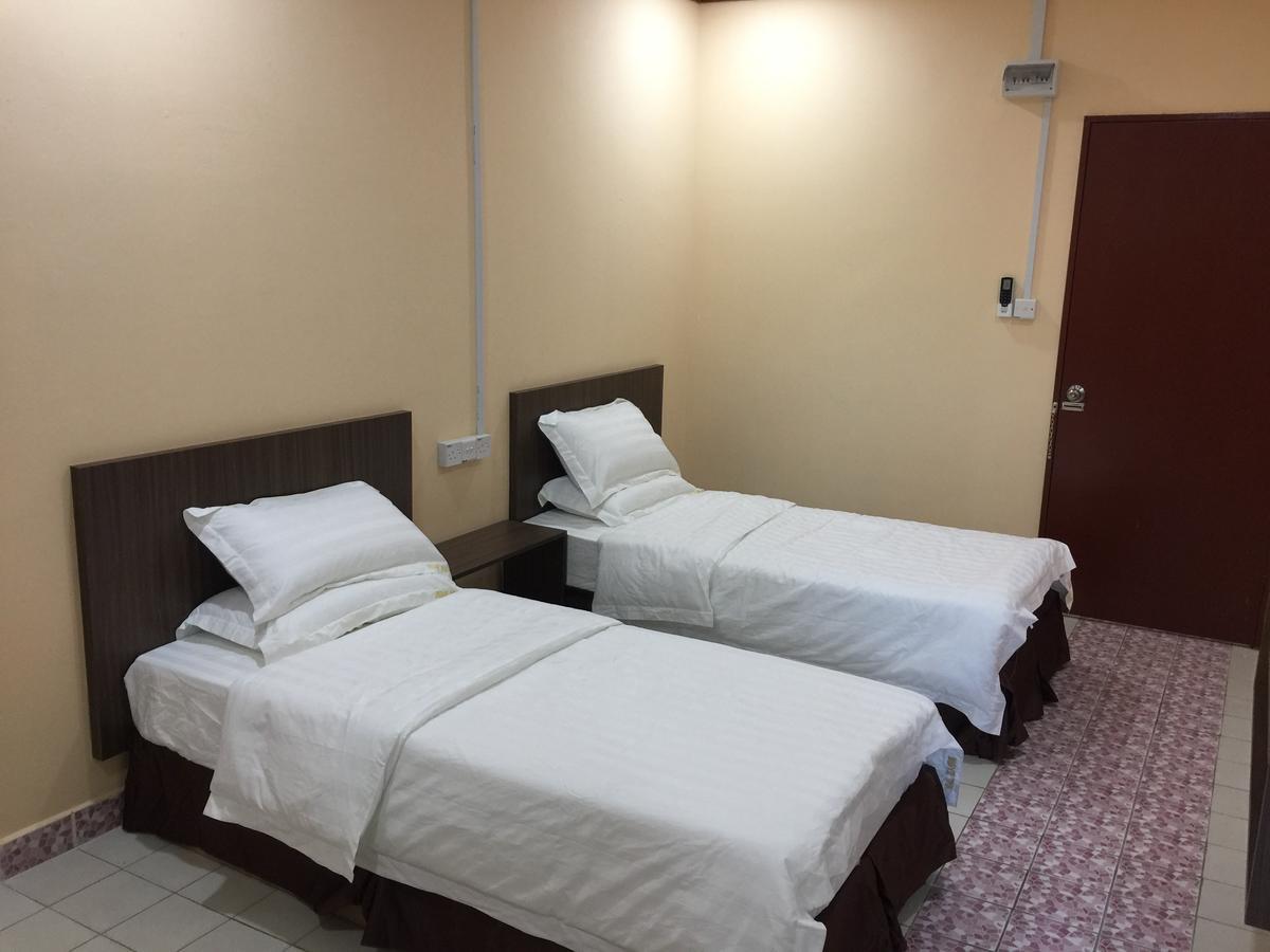Indah Inn Тавау Екстериор снимка