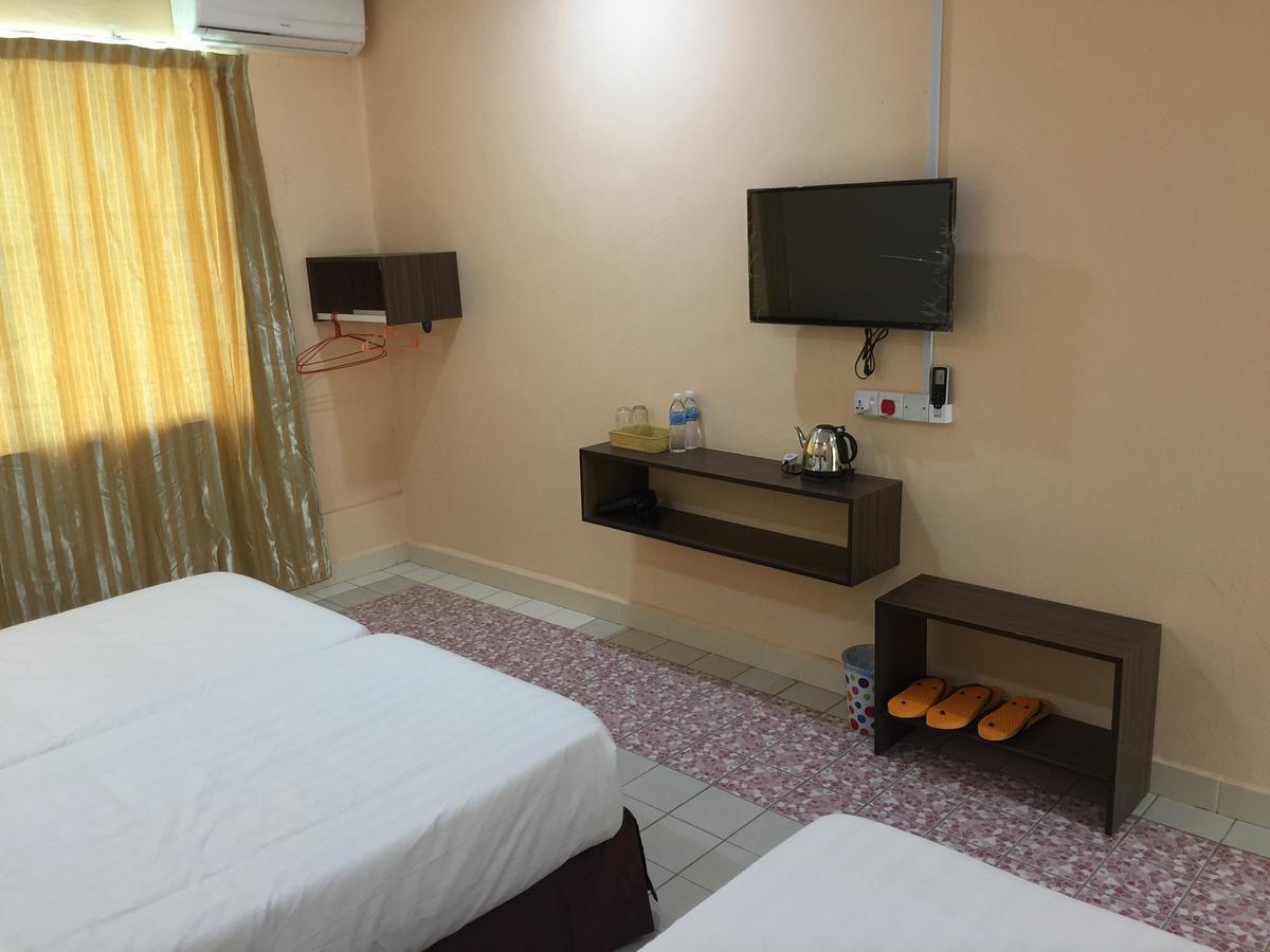 Indah Inn Тавау Екстериор снимка