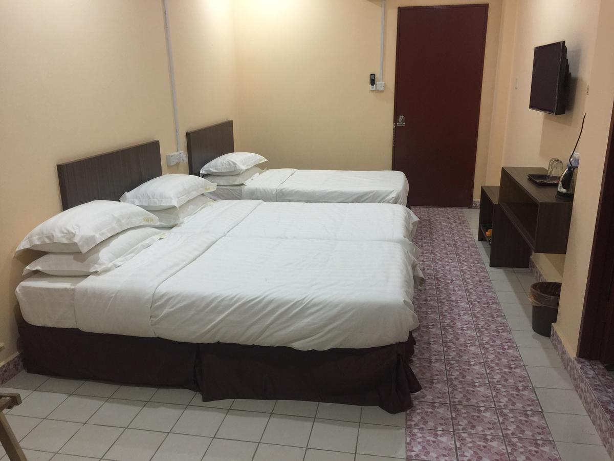 Indah Inn Тавау Екстериор снимка