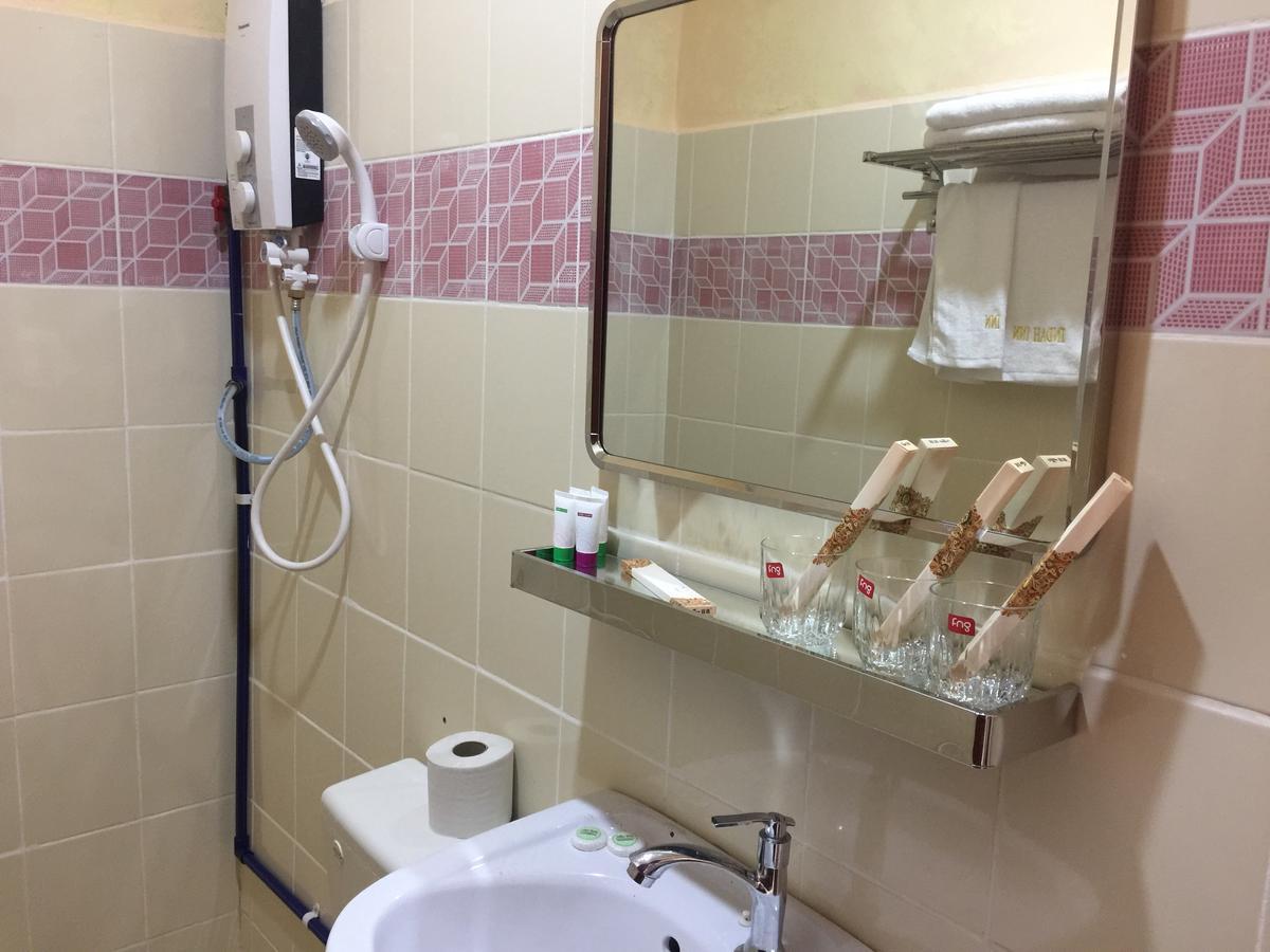 Indah Inn Тавау Екстериор снимка