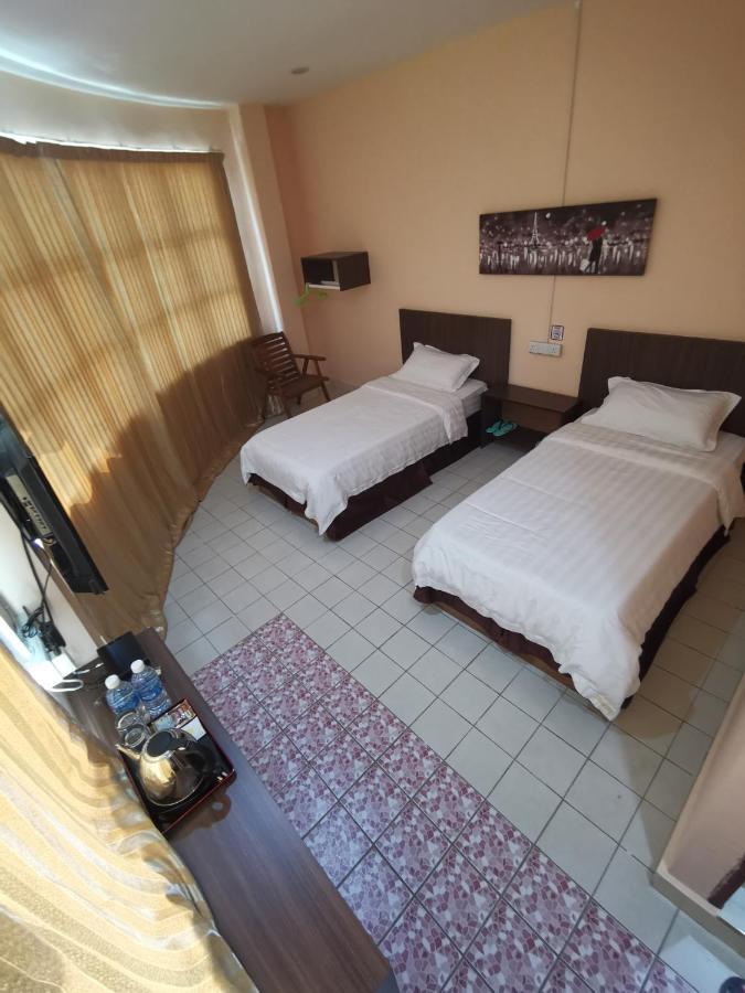Indah Inn Тавау Екстериор снимка